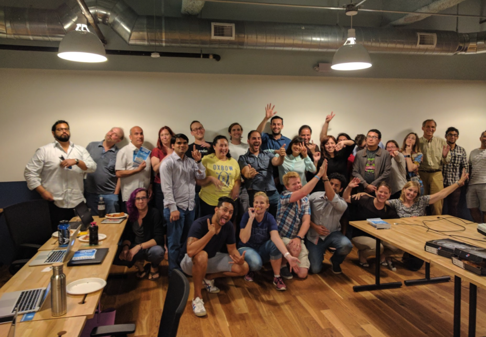 Community participants posing together for a group photo