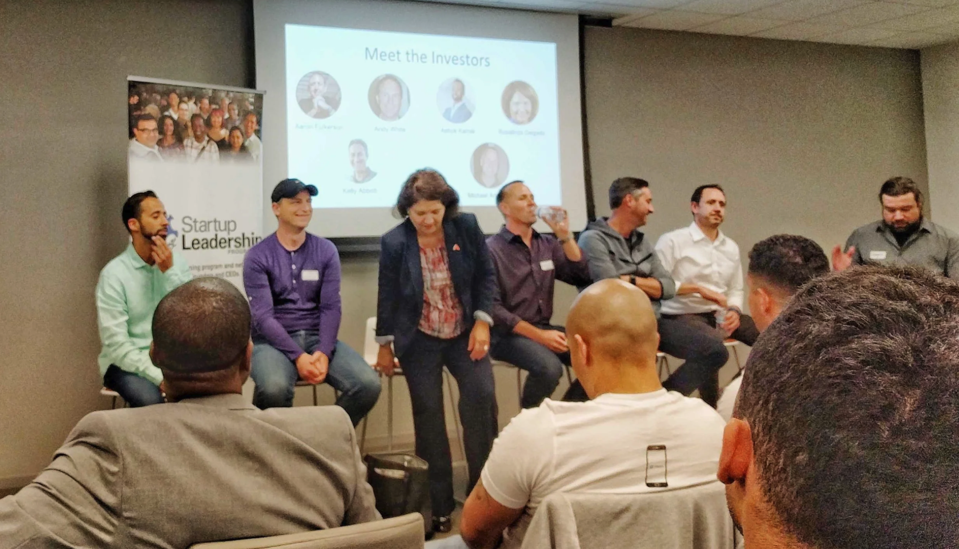 An investor panel speaking to an audience of entrepreneurs